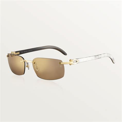 white cartier buffalo horn glasses.